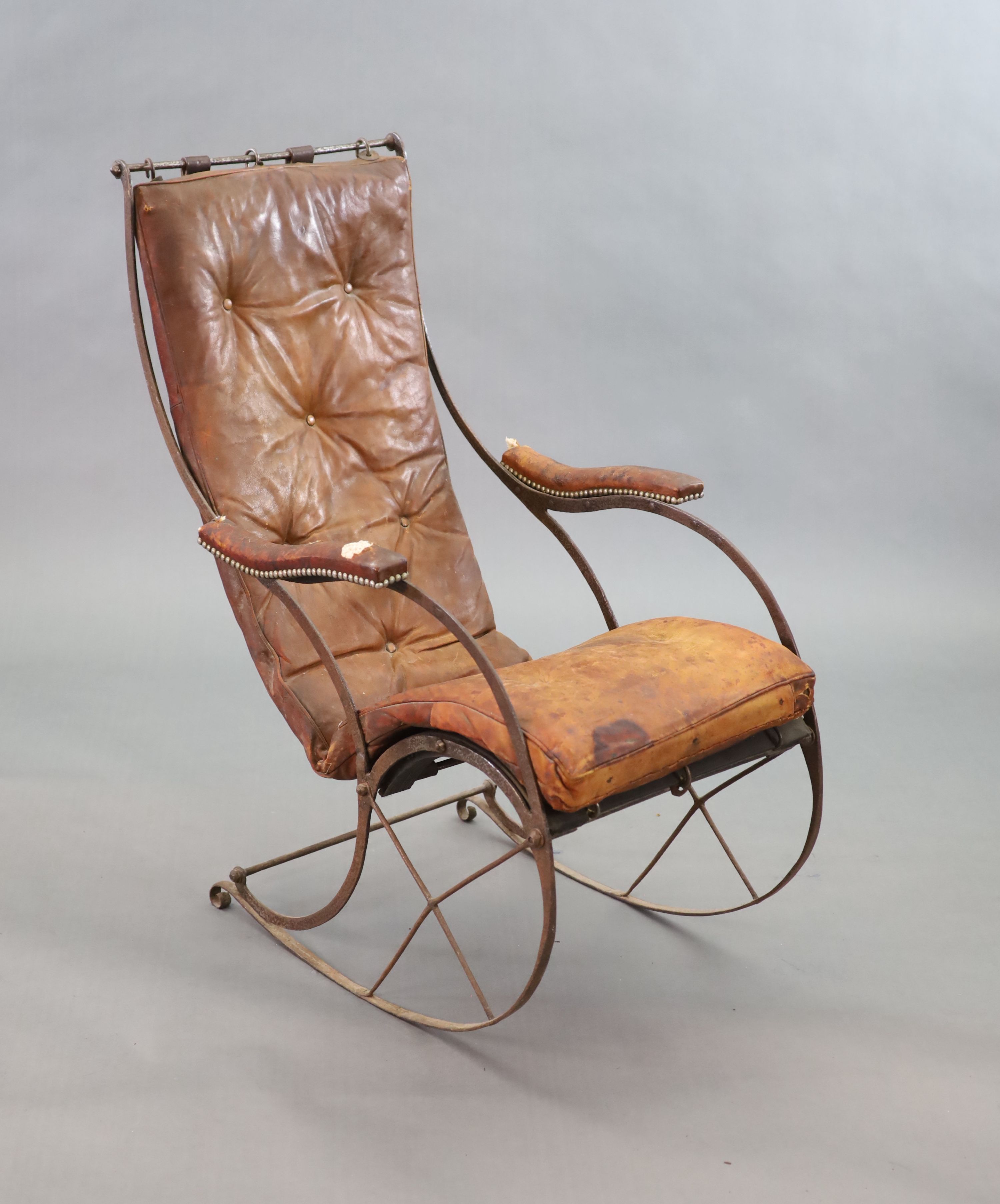 After R.W Winfield & Co, Birmingham, a mid 19th century rocking chair, 59cm wide, 83cm deep, 105cm high.